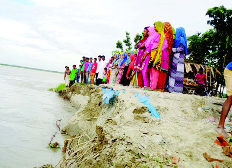 GANGACHARA (Rangpur): Students of Soudpara Islamia Madrasa in Gangachara Upazila formed a human chain demanding measures to protect the area from Teesta River erosion on Tuesday.