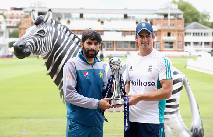 Captains Misbah Ul Haq of Pakistan and Alastair Cook of England pose with the Investec Trophy during the England nets session at Lord's Cricket Ground in London, England on Wednesday.