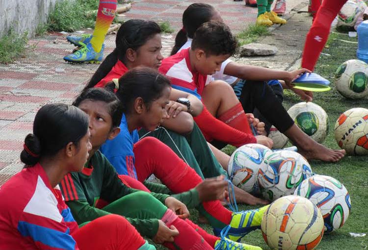 Members of Bangladesh National Women's Under-16 team rest a while during their practice session at the BFF Artificial Turf on Wednesday.