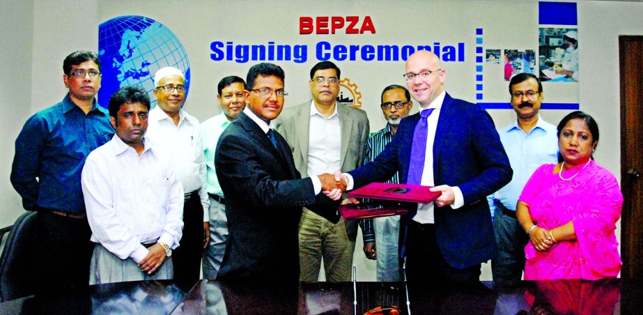 Abdul Halim Molla, Member (IP) of BEPZA and Willem van Helden, Managing Director of Netherlands based Ms. Lintas Bangladesh Co Ltd signed a deal in BEPZA Complex in the city on Thursday for establishing a garment factory in Adamjee EPZ with an investment