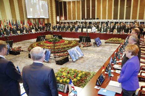 Leaders observe a minute of silence for victims of the Nice attack before the opening session of the Asia-Europe summit in Ulan Bator.