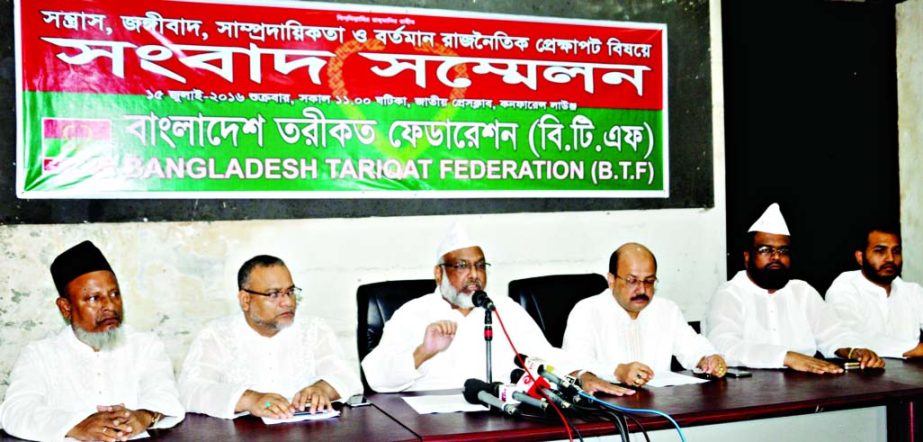 Chairman of Bangladesh Tariqat Federation Mujibul Bashar Maizbhandari speaking at a press conference on 'Extremism, communalism and present political situation' at Jatiya Press Club on Friday.