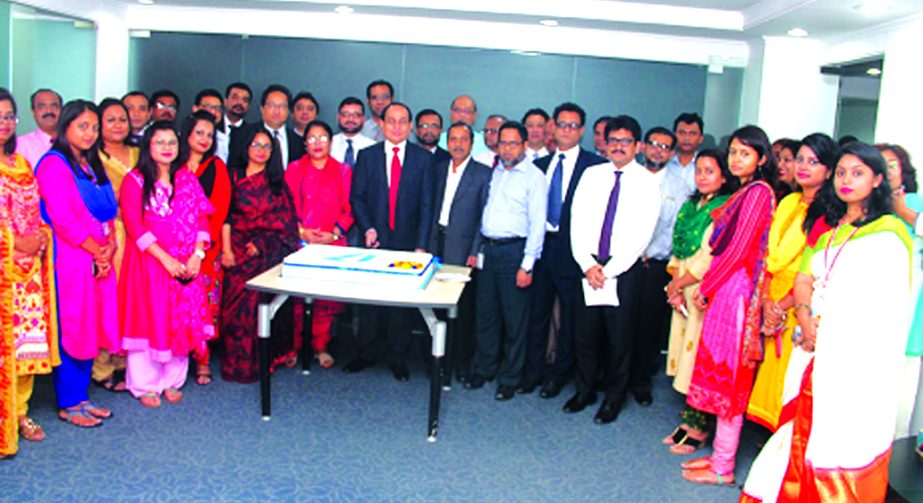 M. Fakhrul Alam, Managing Director of the One Bank Limited along with senior executives and employees cuts a cake while observed its 17th Founding Anniversary in the city recently.