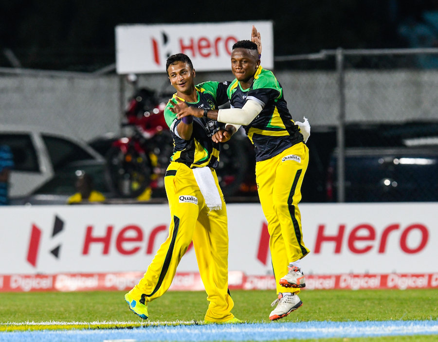 Andre McCarthy (R) celebrates with Shakib Al Hasan (L) of Jamaica Tallawahs after the dismissal of Evin Lewis of St Kitts & Nevis Patriots during Match 17 of the Hero Caribbean Premier League match between Jamaica Tallawahs v St Kitts & Nevis Patriots at