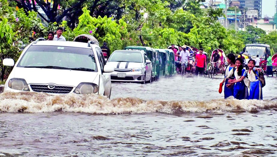 The low-lying areas of Chittagong city inundated due to heavy rainfall on Sunday. This photo was taken from Agrabad area.