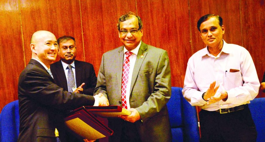 Engr Taqsem A Khan, Managing Director of Dhaka WASA and Kazuhiko Higuchi, Country Director of Asian Development Bank (ADB) sign a loan contract of $ 275m at WASA head office on Monday. Mohammad Mezbauddin, Senior Secretary of Economic Relations Division w