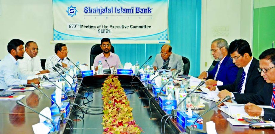 The 673rd meeting of the Executive Committee (EC) of Shahjalal Islami Bank Limited held in the city recently. Md. Sanaullah Shahid, Chairman of the EC, Chairman of the Board of Directors of the Bank Engineer Md. Towhidur Rahman, Directors Anwer Hossain Kh