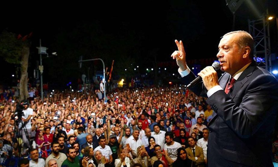 Turkish President Recep Tayyip Erdogan addresses his supporters outside his residence in Istambul on Tuesday.