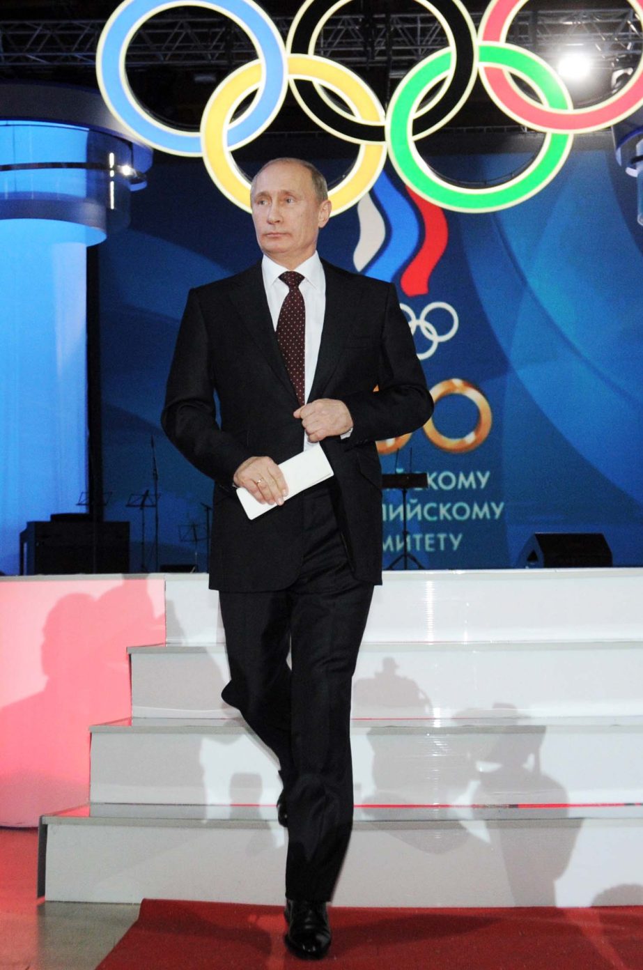 In this Nov. 25, 2011 file photo then Russian Prime Minister Vladimir Putin speaking at a meeting marking the 100th anniversary of the Russian Olympic Committee in Moscow. The executive board of the International Olympic Committee has a teleconference on