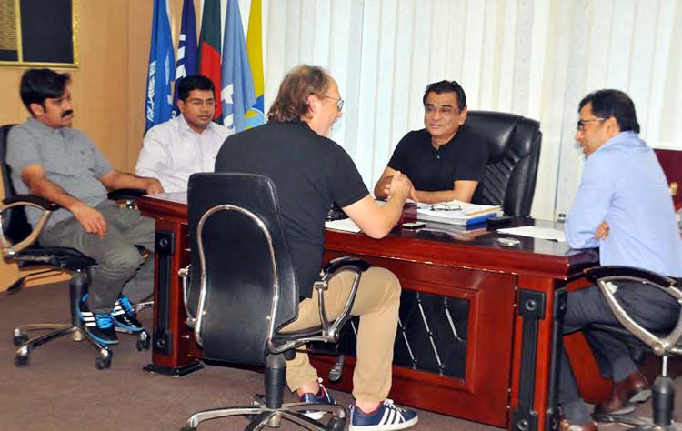 President of Bangladesh Football Federation (BFF) Kazi Salahuddin talking to the Head Coach of Bangladesh National Football team Tom Saintfiet at the BFF House on Tuesday.