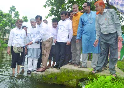FENI: Md Ameen-ul- Ahsan, DC, Feni releasing fish fries on the occasion of the National Fisheries Week on Wednesday .