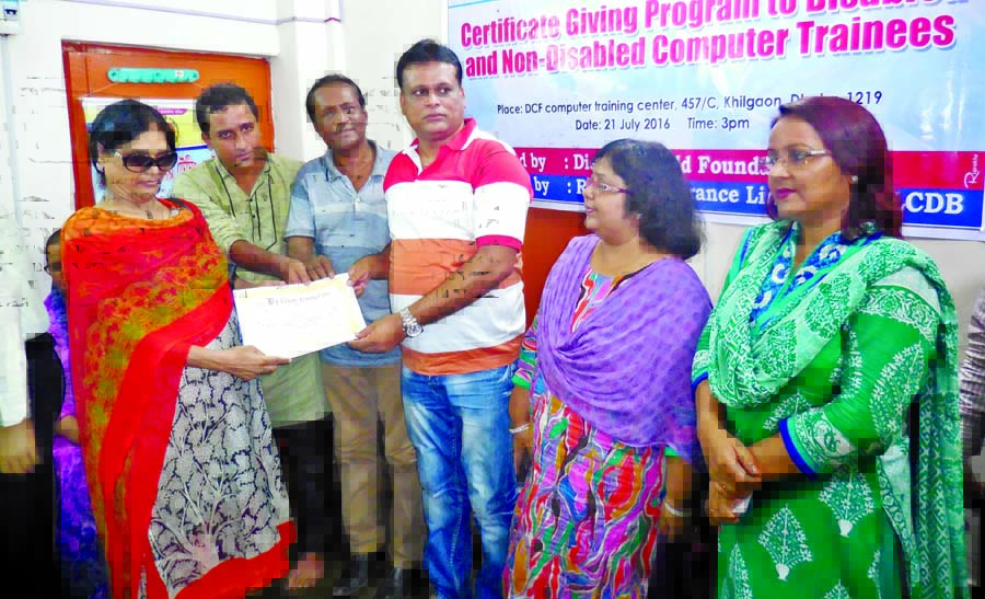Participants at the computer training certificates distribution programme organised by the Disabled Child Foundation at its computer training center in the city on Thursday.