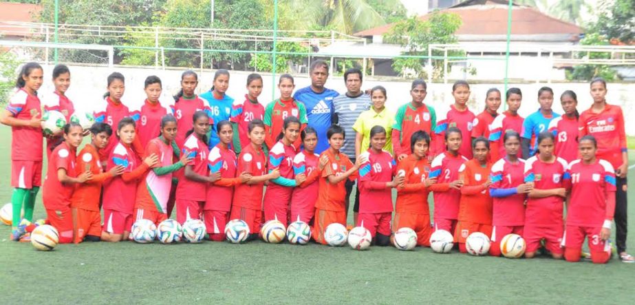Members of Bangladesh National Women's Under-16 Football team pose for a photo session at the BFF Artificial Turf on Thursday.
