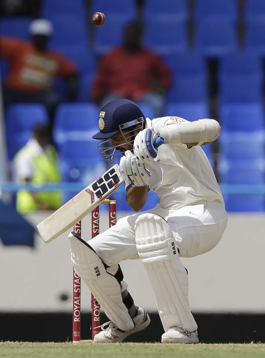 India's Murali Vijay takes evasive action to avoid being hit by a delivery off West Indies' Shannon Gabriel during day one of their first cricket Test match at the Sir Vivian Richards Stadium in North Sound, Antigua on Thursday.