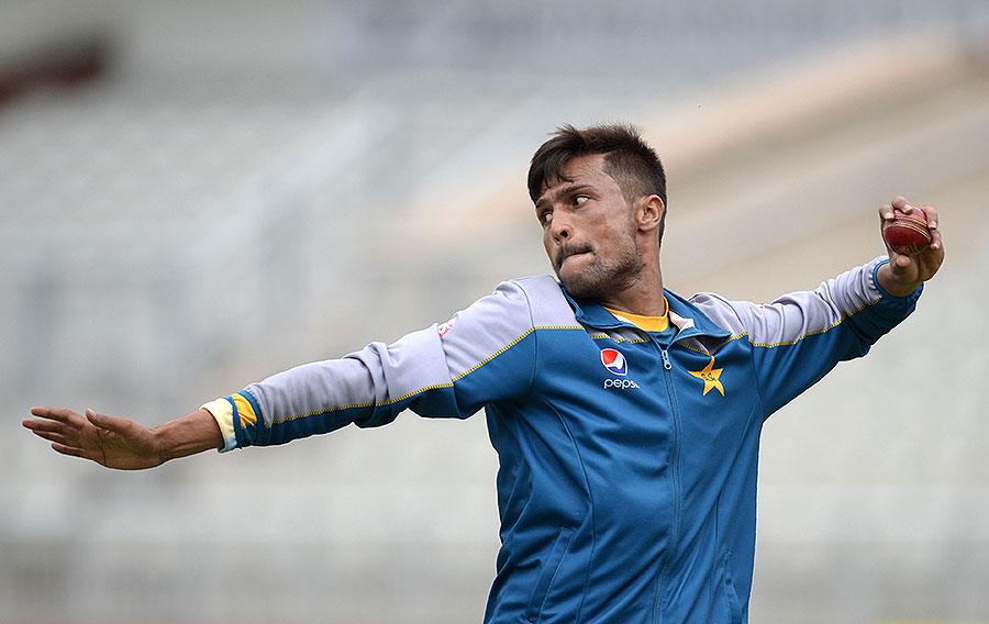 Mohammad Amir throws the ball in training at Old Trafford on Thursday.