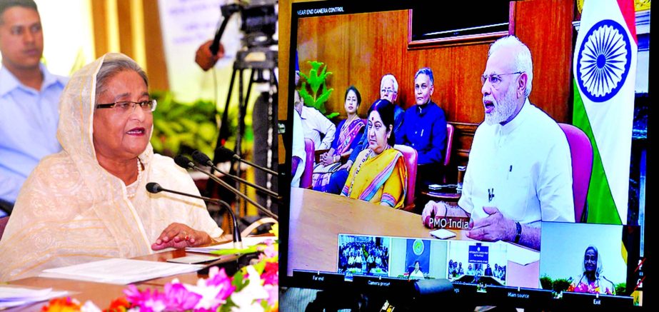 Prime Minister Sheikh Hasina and Indian Prime Minister Narendra Modi speaking through video-conference after opening the Benapole and Petrapol combined check post on Thursday.