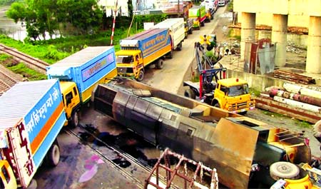 The engine of a Dhaka-bound container-laden train from Chittagong veered off the railway track after crashing into a track at Fatehpur level-crossing in Feni on Thursday.