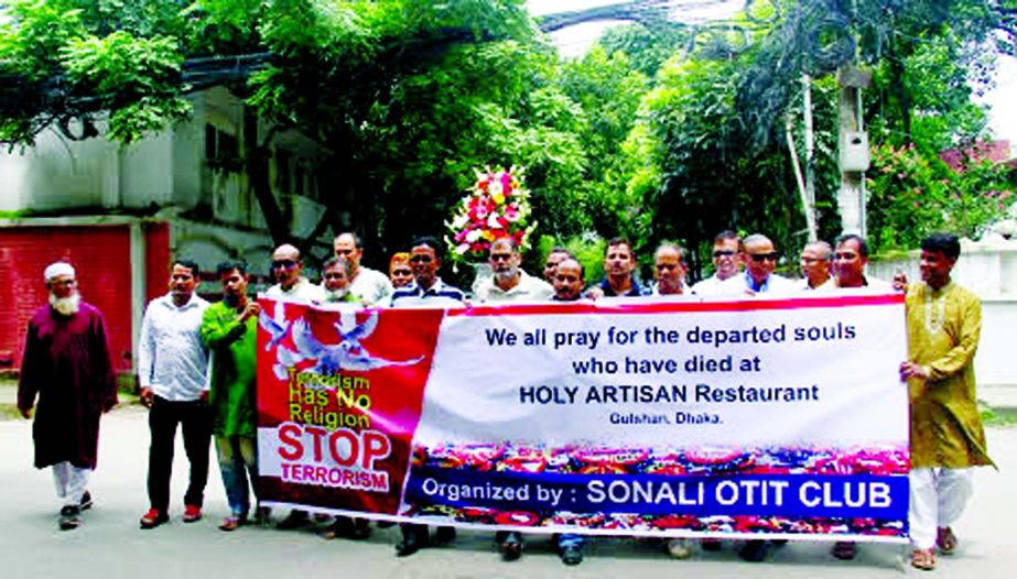 Members of Sonali Otit Club brought out a rally in the city street on Friday.