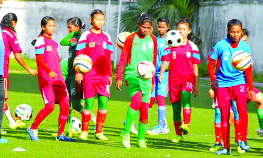 Players of Bangladesh National Women's Under-16 Football team during their practice session at the BFF Artificial Turf on Friday.