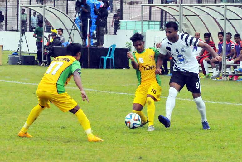 Action from the JB Bangladesh Premier League (BPL) Football match between Rahmatganj Muslim Friends Society and Mohammedan Sporting Club at MA Aziz Stadium on Monday.