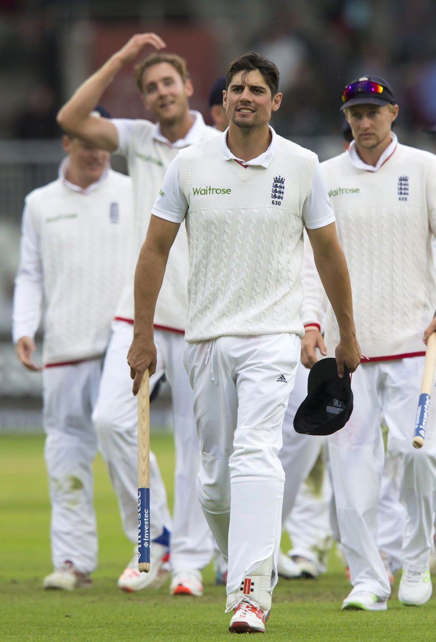 Alastair Cook leads his team off after victory, levelled the series against Pakistan on the 4th day of 2nd Investec Test at Old Trafford on Monday.