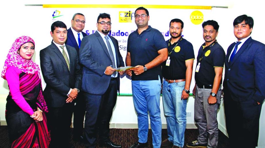 M Nazeem A Choudhury, Head of Consumer Banking of Eastern Bank Limited (EBL) and Navidul Huq, Director of DigiJadoo Broadband Limited exchanging documents after signing a Zero percent Installment Plan (ZIP) deal in Dhaka recently. Under the agreement, EBL
