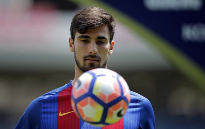 FC Barcelona's new signing Andre Gomes controls the ball during his official presentation at the Mini Stadi stadium in Barcelona, Spain on Wednesday. Barcelona has signed Portugal midfielder Andre Gomes after securing his transfer from rival Spanish club