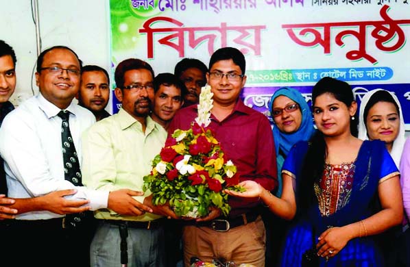 FENI: Akhirul Alam Bablu and Abu Jubair Munna, President and Organising Secretary of Feni District Cultural Parishad greeting Md Shahrirar Alam, Senior Assistant SP, Feni at his farewell programme on Sunday.