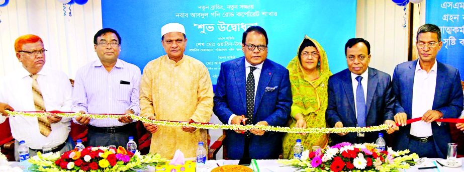 Shaikh Md. Wahid-uz-Zaman, Chairman of Janata Bank Limited cutting tape at the new branding ceremony of Nawab Abdul Gani Road Corporate Branch of Dhaka on Thursday. Md. Mahabubur Rahman Hiron and Manik Chandra Dey, Directors of the bank, Lokman Hossain Mi