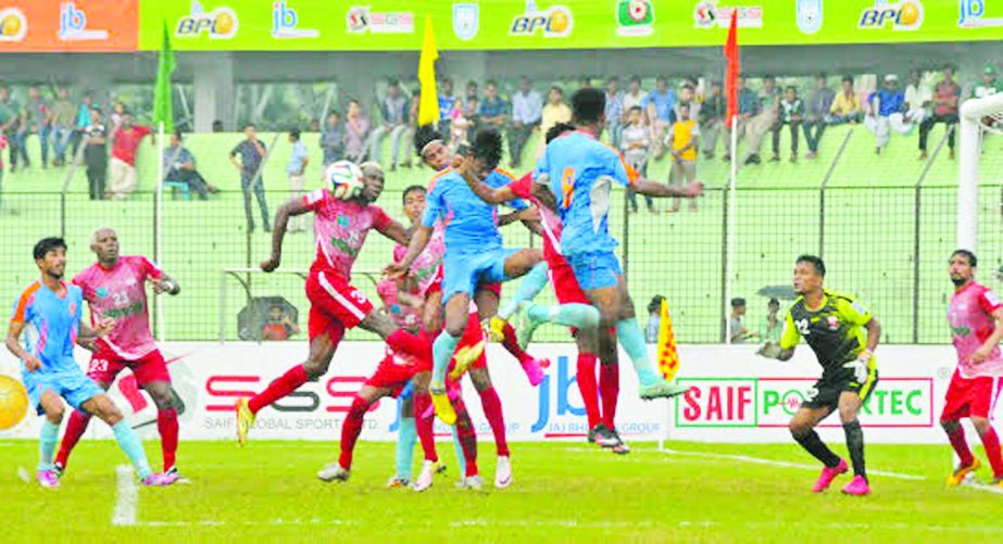 A moment of the match of the JB Group BPL Football between Dhaka Abahani Limited and Soccer Club Feni at the MA Aziz Stadium in Chittagong on Friday.