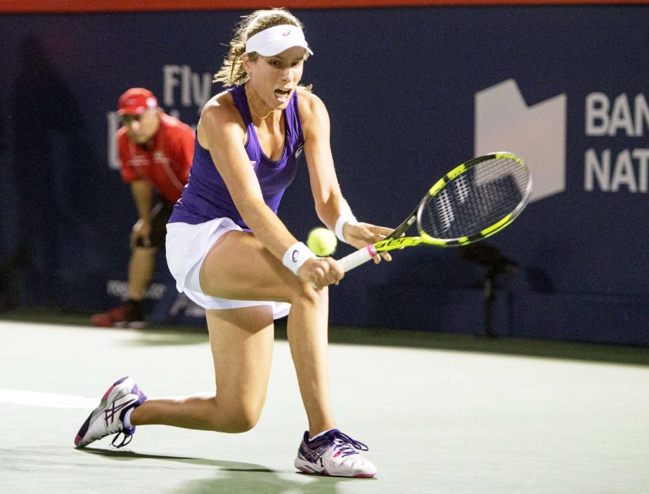 Johanna Konta, of Britain, returns to Kristina Kucova, of Slovakia, at the Rogers Cup tennis tournament in Montreal on Friday.