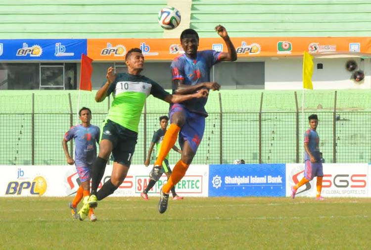 A scene from the match of the JB Group BPL Football between Brothers Union and Team BJMC at the MA Aziz Stadium in Chittagong on Saturday.