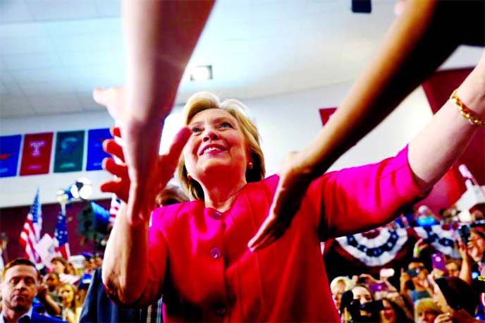 Democratic presidential candidate Hillary Clinton campaigns with vice presidential candidate Sen. Tim Kaine on the campus of Temple University in Philadelphia on Friday. Internet photo