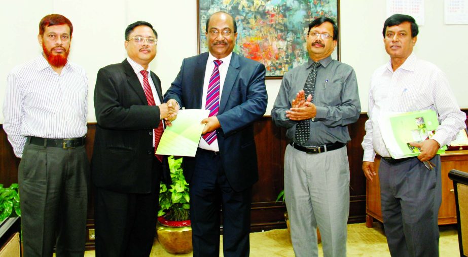 Mohammed Ashfaqul Hoque, Head of SME Division of Shahjalal Islami Bank Ltd, receiving certificate for agricultural and rural credit disbursement from Bangladesh Bank Deputy Governor SK Sur Chowdhury at the BB's head office recently.