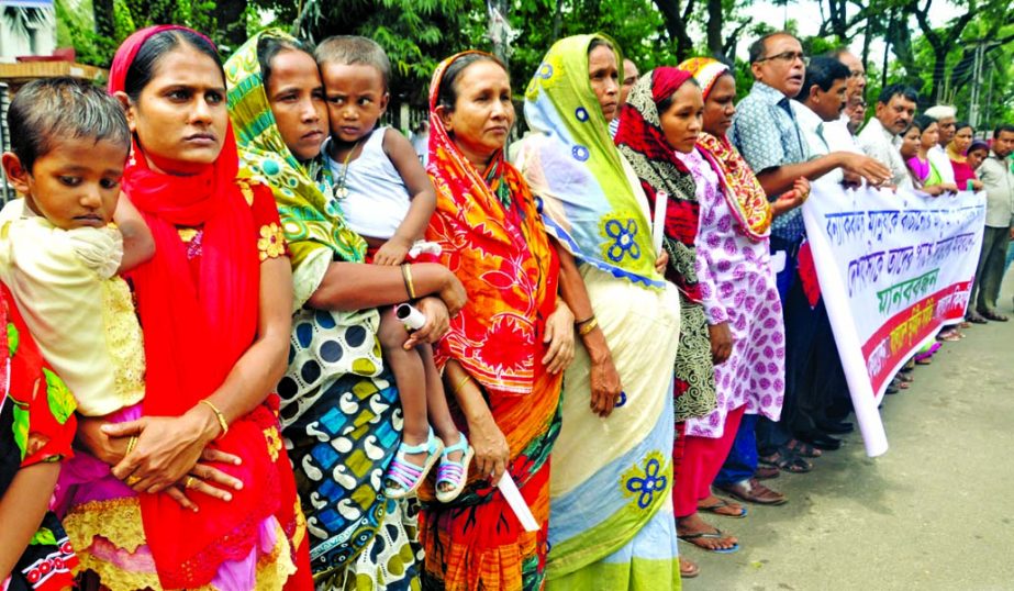 Bangladesh Krishak Federation formed a human chain in front of the Jatiya Press Club on Tuesday demanding relief and rehabilitation for the flood-hit people.