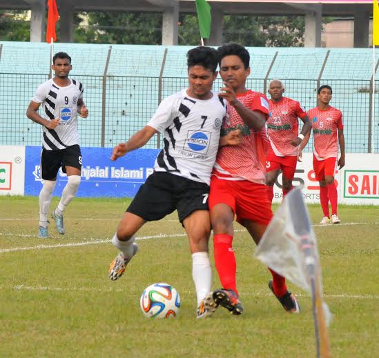 A moment of the match of the JB Group BPL Football between Dhaka Mohammedan Sporting Club Limited and Feni Soccer Club at the MA Aziz Stadium in Chittagong on Tuesday.