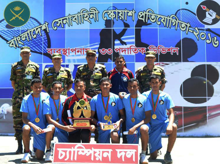 Area Commander of Comilla and GOC of 33 Infantry Division Major General Md Enayet Ullah and players of Comilla Area Team, which emerged as the champions of the Bangladesh Army Squash Competition pose for a photograph at the Comilla Cantonment in Comilla o