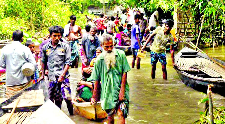 Gaibandha's marginal-income group people have built boats for ferrying people of the flood affected area making some extra income.