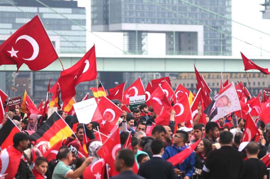Supporters of Turkish President Recep Tayyip Erdogan attend a rally in Cologne, Germany, following the failed coup earlier in the month.