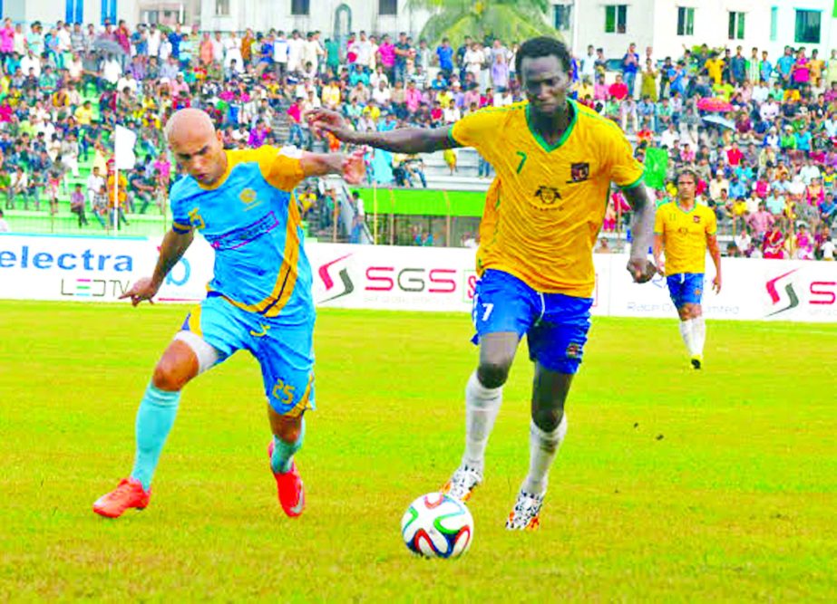 An action from the match of the JB Group BPL Football between Sheikh Jamal Dhanmondi Club Limited and Chittagong Abahani Limited at the Bir Muktijoddha Rafiq Uddin Bhuiyan Stadium in Mymensingh on Friday.