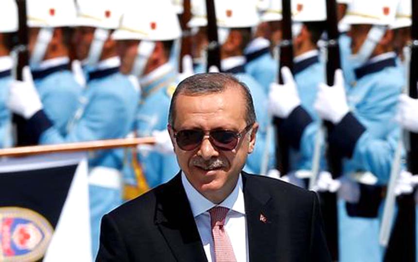 Turkish President Tayyip Erdogan reviews a guard of honour during a welcoming ceremony at the Presidential Palace in Ankara, Turkey on Friday.