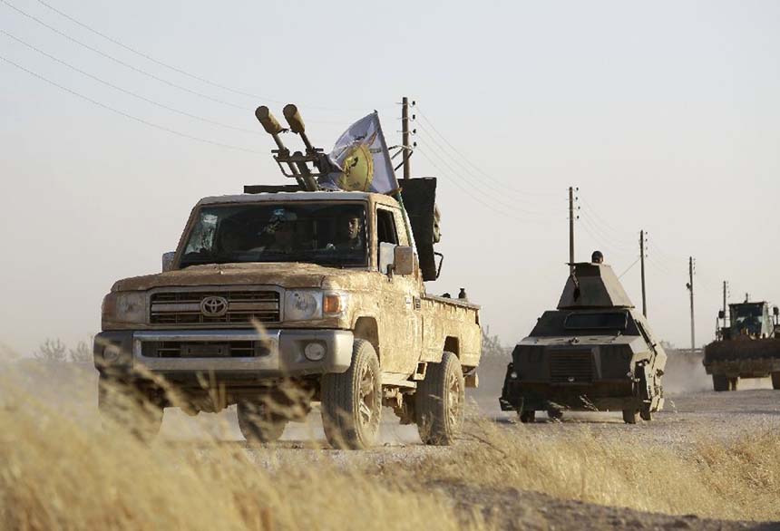 US-backed Kurdish and Arab fighters advance into the Islamic State jihadist group's bastion of Manbij in northern Syria.