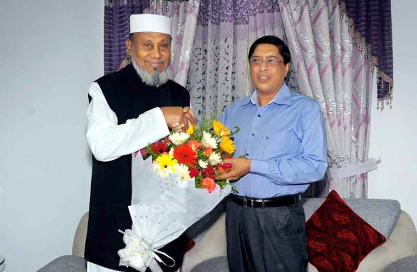 Alhaj A B M Mohiuddin Chowdhury, President, Chittagong City Awami League greeting DC, Mesbah Uddin as he was elected the best DC of the country.