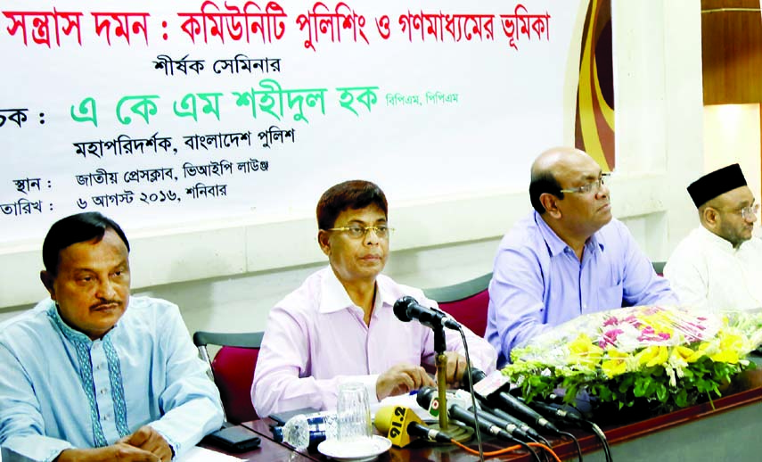 Inspector General of Police AKM Shahidul Haque speaking at a seminar on 'Resisting Militancy and Terrorism: Role of Community Policing and Mass Media' organised by Amar Kagoj at the Jatiya Press Club on Saturday.