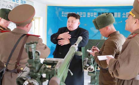 North Korea warned it would respond to any aggression by reducing US to a "sea of flames""."