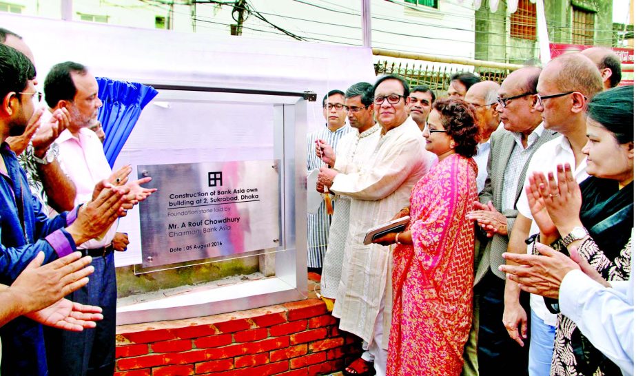 A Rouf Chowdhury, Chairman of Bank Asia is unveiling the plaque of construction work of Bank Asia Building at Sukrabad in the City on Friday. Vice Chairman of the Bank AM Nurul Islam, Chairman of Board Executive Committee Rumee A Hossain, Director Shah Md