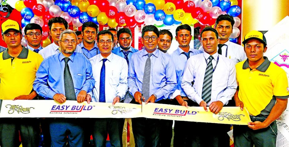 RN Paul, director of RFL opens the building materials outlet 'Easy Build' at Holland Super Market in Badda on Sunday. Omar Khalid, deputy manager, Md Amdadul and Md Tafazzal, brand managers of Easy Build were also present during the shop opening program