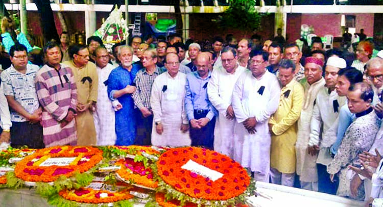 Leaders and activists of pro-Awami League DUJ and BFUJ paying tributes to Father of the Nation Bangabandhu Sheikh Mujibur Rahman by placing floral wreaths at the Mazar of Bangabandhu in Tungipara on Tuesday on the occasion of National Mourning Day.