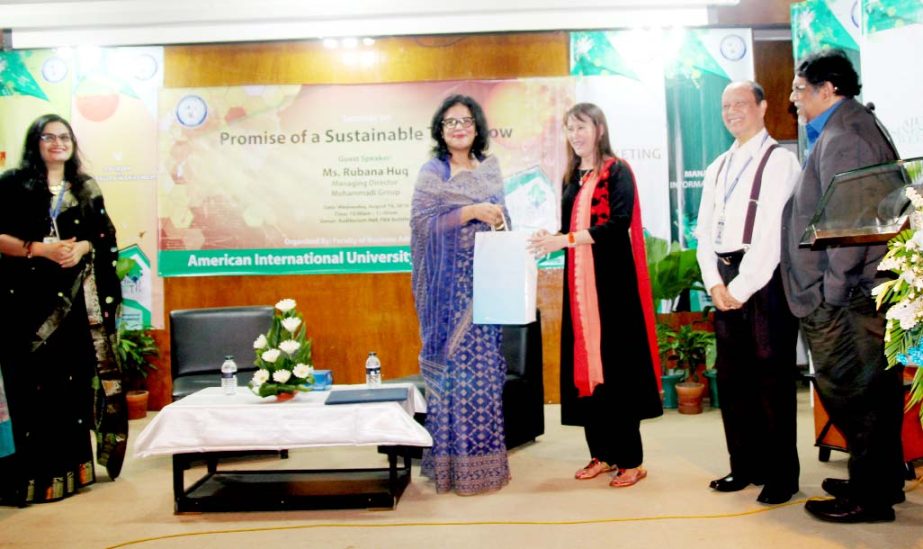 Rubana Huq, Managing Director, Mohammad Group is seen with the VC of American International University-Bangladesh Dr Carmen Z Lamagna at a seminar organised at the Business Week' 2016 at AIUB Campus in the capital on Wednesday.