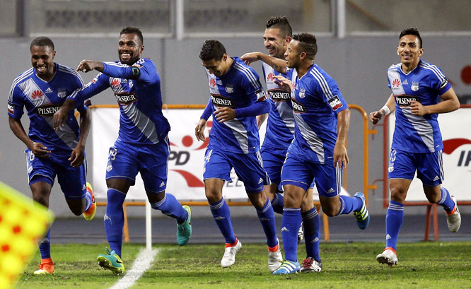 Gabriel Achilier of Ecuador's Emelec (second from the left) celebrates after scoring, followed by his teammates during a Copa Sudamericana soccer match against Peru's Universitario in Lima, Peru on Tuesday.